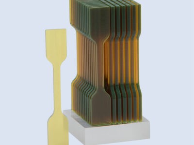 First Standardized Material Testing of 2PP 3D-Printed Parts